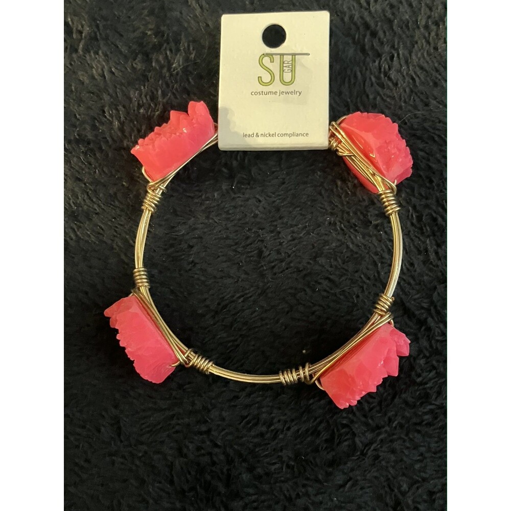 Unique gold tone with pink bracelet